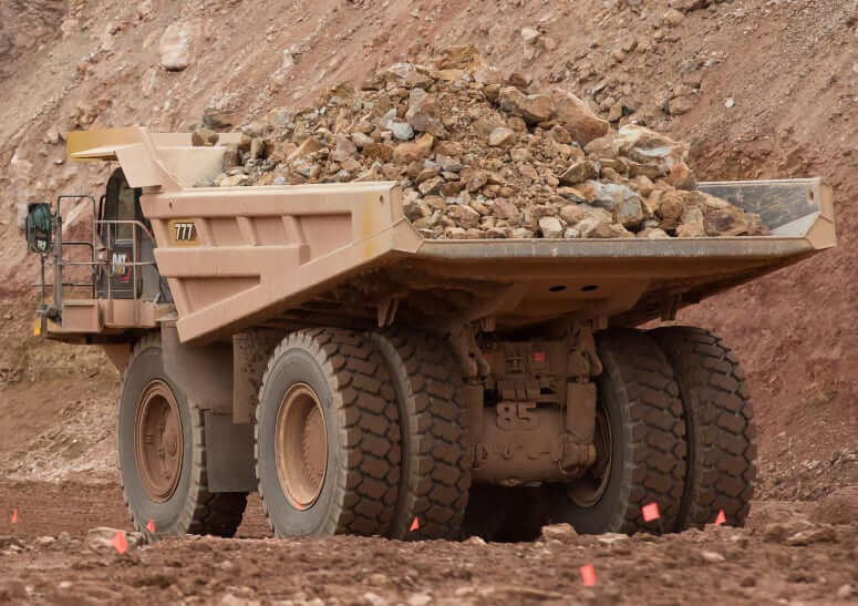 Грузоподъемность и объемы кузова самосвала CAT 777